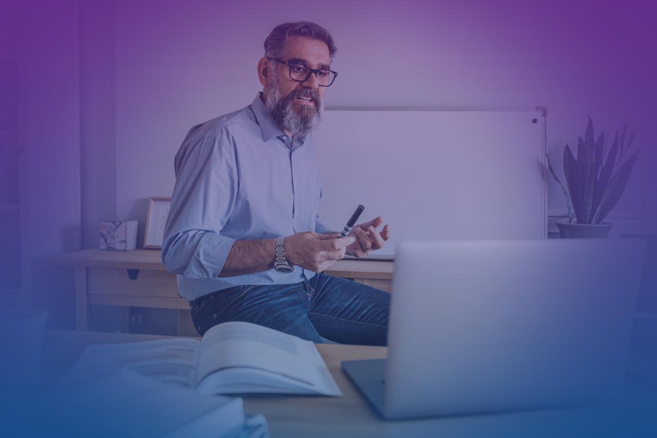 Teacher teaching via laptop, distance education