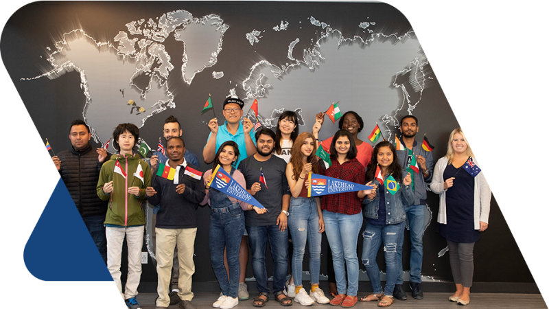 Lakehead University International Students Waving International Flags