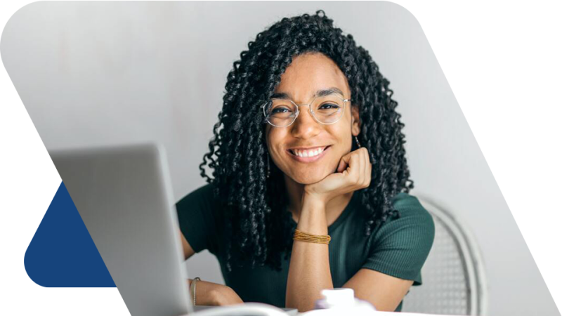 Women wearing glasses at a laptop